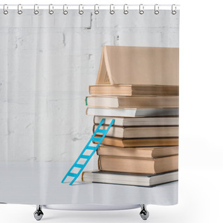 Personality  Pile Of Books And Small Blue Step Ladder Near White Brick Wall Shower Curtains