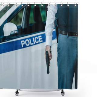 Personality  Cropped Image Of Policeman In Bulletproof Vest Holding Gun Near Car At Street Shower Curtains
