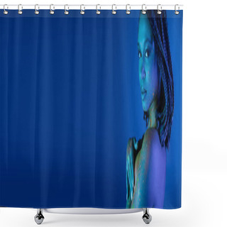 Personality  Youthful, Seductive And Bare-chested African American Woman In Colorful Neon Body Paint Looking At Camera And Covering Breast With Hand On Blue Background With Cyan Lighting Effect, Banner Shower Curtains