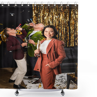 Personality  Asian Woman With Champagne Looking At Camera Near Friends With Party Horn During New Year Party On Black Background  Shower Curtains