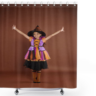 Personality  Excited Girl In Halloween Costume And Pointed Hat Standing With Raised Hands On Brown Background Shower Curtains