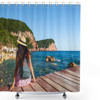 Personality  Back View Of Woman With Backpack Sitting On Bridge Near Sea In Budva, Montenegro Shower Curtains
