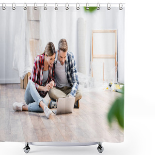 Personality  Happy Young Couple Looking At Laptop While Sitting On Floor On Blurred Foreground At Home Shower Curtains