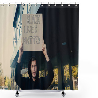 Personality  Serious Young Activist In Hoodie Holding Placard With Black Lives Matter Lettering On Street Shower Curtains