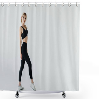 Personality  Side View Of Young Blond Sportswoman In Black Sportswear Posing Isolated On Grey Shower Curtains