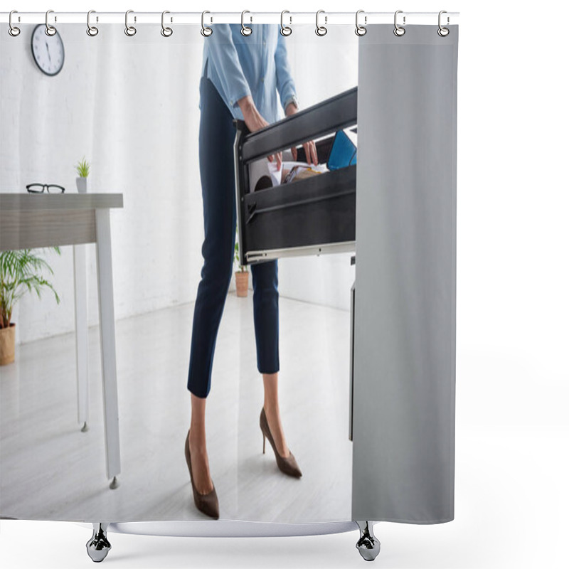 Personality  Cropped view of businesswoman searching dossier in cabinet driver in office shower curtains