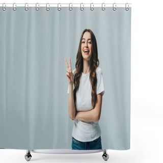 Personality  Happy Beautiful Girl In White T-shirt Showing Victory Sign Isolated On Grey Shower Curtains