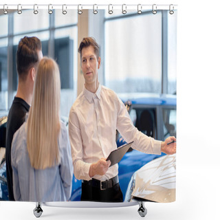 Personality  Dealer Car Shop. Rear View On Amily Couple Choosing New Car Auto Before Buying Purchasing Auto. Affable Friendly Caucasian Guy Consultant Manager Have Talk With Clients, Explain Characteristics Shower Curtains