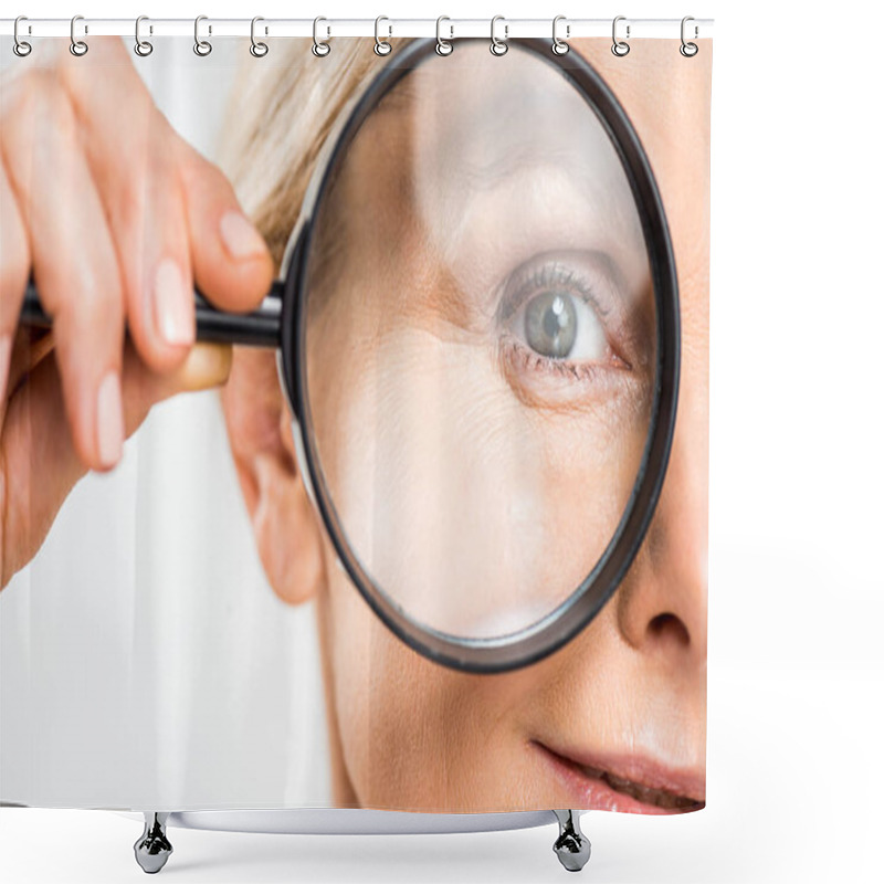 Personality  Selective Focus Of Mature Woman Looking At Camera And Holding Loupe Isolated On Grey  Shower Curtains
