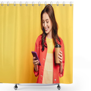Personality  Happy Young Woman Holding Coffee To Go And Using Smartphone On Yellow Shower Curtains