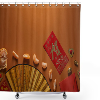 Personality  Top View Of Peeled Tangerine, Fan With Hieroglyphs And Red Envelope On Brown Background Shower Curtains