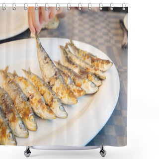 Personality  Hand Of Little Girl Catching A Sardine Cooked From The Tail In A Big White Dish Ready To Eat On Table Of Restaurant Shower Curtains