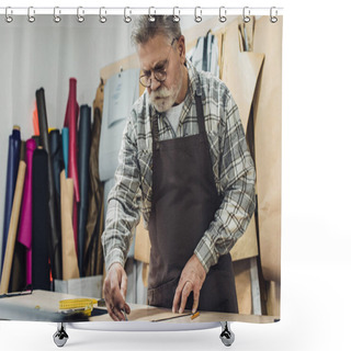 Personality  Focused Mature Male Leather Handbag Craftsman In Apron And Eyeglasses Working At Studio Shower Curtains