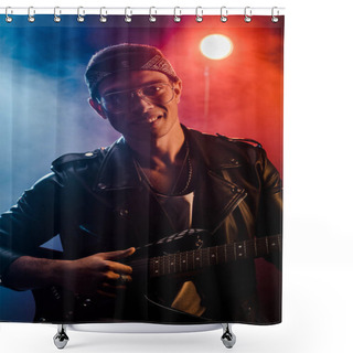 Personality  Cheerful Male Musician In Leather Jacket Playing On Electric Guitar On Stage With Smoke And Dramatic Lighting  Shower Curtains