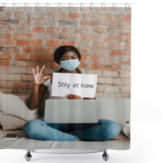 Personality  African American Freelancer In Medical Mask With Laptop Showing Okay Sign And Placard With Stay At Home Lettering On Sofa In Living Room Shower Curtains