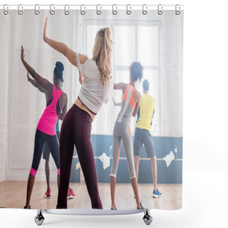 Personality  Back View Of Multiethnic Zumba Dancers Performing Movements In Dance Studio Shower Curtains