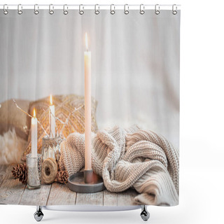 Personality  Cozy Home Interior, Burning Candles, Warm Sweater On A Wooden Table.Seasonal Autumn-winter Concept Of A Cozy Home, Minimal Decoration, Warming Shower Curtains