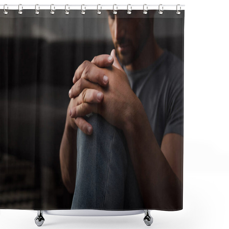 Personality  sad man sitting on floor at home, selective focus shower curtains