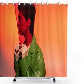 Personality  Side View Of Trendy Woman In Green Leather Jacket And Transparent Cylinder Shape Plastic On Head On Orange And Pink Background Shower Curtains