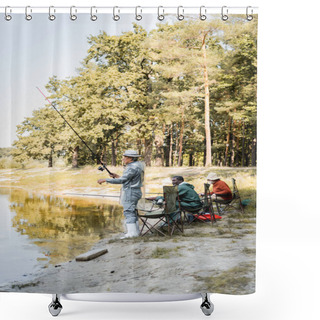 Personality  Asian Man Fishing Near Interracial Friends On Chairs On Lake Coast  Shower Curtains