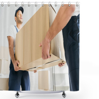 Personality  Low Angle View Of Multiethnic Movers In Uniform Carrying Huge Carton Box  Shower Curtains
