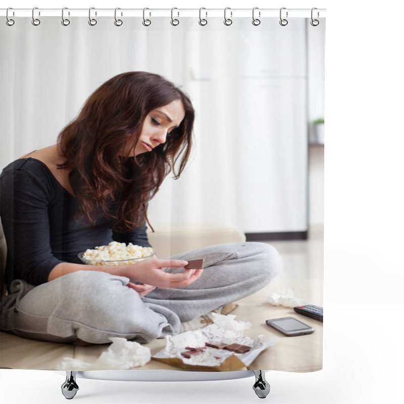 Personality  Depressed young woman eating chocolate shower curtains