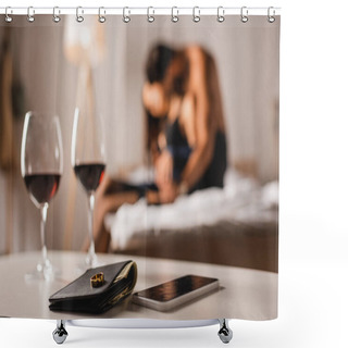 Personality  Selective Focus Of Wedding Ring On Wallet Near Smartphone And Glasses Of Wine With Shirtless Man Embracing Woman On Bed  Shower Curtains