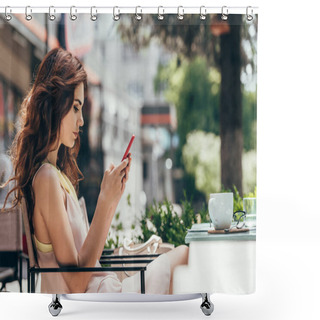 Personality  Side View Of Young Woman Using Smartphone While Sitting At Table With Cup Of Coffee In Cafe Shower Curtains