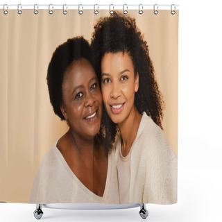 Personality  Smiling African American Adult Daughter And Middle Aged Mother Hugging Cheek To Cheek Isolated On Beige Shower Curtains
