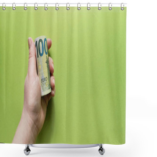 Personality  Left Hand Holding 100 Euro Banknotes Rolled Up With A Tube Or A Roll,issued In 2019 With Face Value Of One Hundred On Green Backdrop.Limiting Cash Payments To Prevent Spread Of Coronavirus.Copy Space Shower Curtains