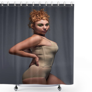 Personality  Young Plus Size Woman With Red Hair And Bold Makeup In Beige Underwear With Hand On Hip On Grey Shower Curtains