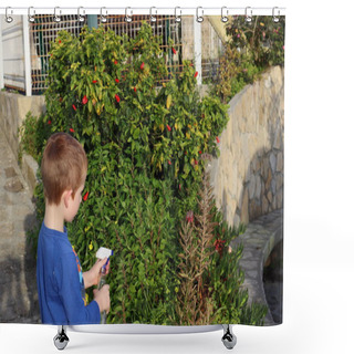 Personality  A Six-year-old Blond Boy Sprays Plants In A Green Garden. Shower Curtains