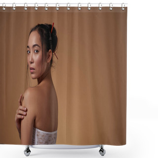 Personality  Side View Of Serious Elegant Asian Girl Hugging Herself And Looking At Camera. Beautiful Young Brunette Slim Woman Wearing Tank Top. Female Beauty. Isolated On Orange Background In Studio. Copy Space Shower Curtains