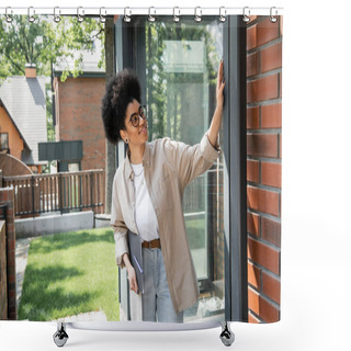 Personality  Pleased African American Real Estate Agent With Folder Touching Window Of Modern Cottage Shower Curtains