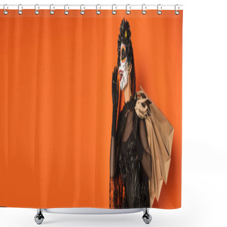 Personality  Happy Woman In Black Creepy Costume And Sugar Skull Makeup Holding Shopping Bags And Screaming To Somebody Isolated On Orange, Banner Shower Curtains