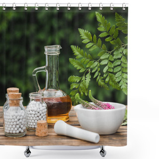 Personality  Selective Focus Of Pestle Near Mortar With Flowers, Glass Bottles And Jug With Oil On Wooden Table  Shower Curtains