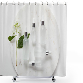 Personality  Top View Of Plate With Jasmine And Cosmetic Glass Bottles On White Surface Shower Curtains