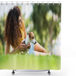 Personality  Selective Focus Of Curly Woman Looking Away And Laughing While Lying On Lawn With Jack Russell Terrier Dog Shower Curtains