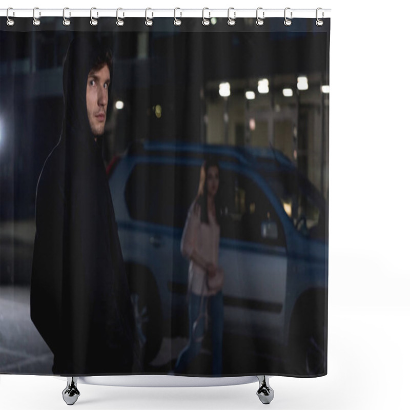 Personality  Selective Focus Of Thief Looking At Camera Near Woman Walking At Nighttime Shower Curtains