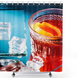 Personality  Mixed Alcohol Cocktail With Whiskey And Orange Near Ice Cubes On Blue Shower Curtains