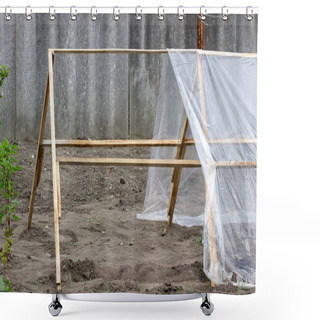Personality  Stage Of Building A Greenhouse From Wooden Slats And Polyethylene In The Garden. Selective Focus. Shower Curtains