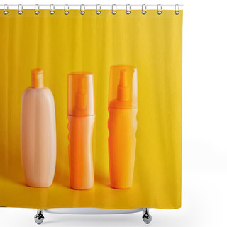 Personality  Suntan Cosmetics In Bottles On Dark Yellow Background Shower Curtains