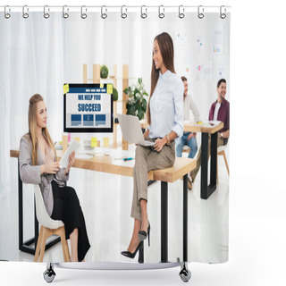 Personality  Selective Focus Of Multiethnic Businesswomen At Workplace With We Help You Succeed Inscription On Computer Screen And Colleagues Behind In Office Shower Curtains