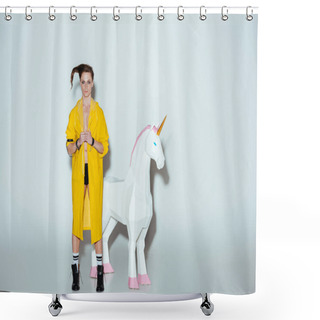 Personality  Fashionable Man With Hairstyle In Yellow Raincoat Standing With Big Unicorn Toy, On Grey Shower Curtains