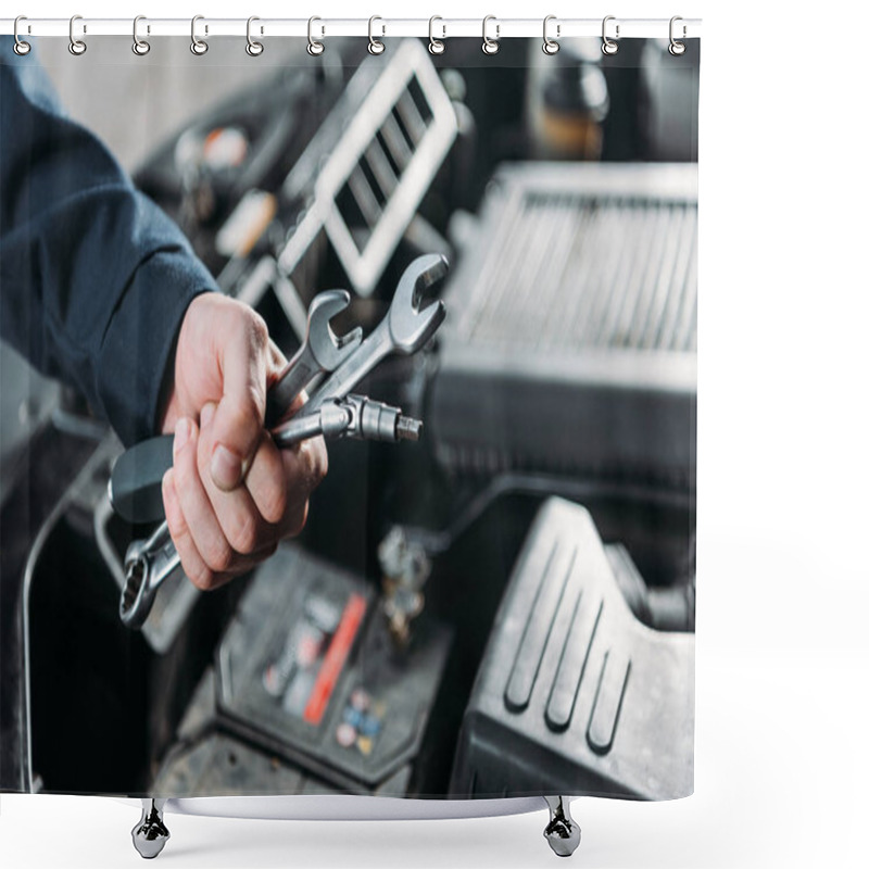Personality  cropped view of mechanic holding wrenches in hand shower curtains