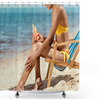 Personality  Cropped Image Of Woman Applying Sunscreen Lotion On Skin While Sitting On Deck Chair On Sandy Beach  Shower Curtains