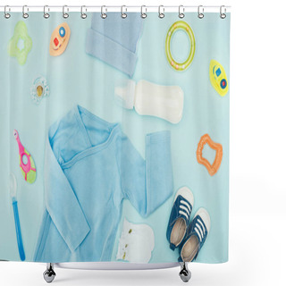 Personality  Top View Of Baby Clothes And Accessories With Milk Isolated On Blue Shower Curtains