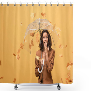 Personality  Shocked Curly Woman In Brown Jacket Holding Umbrella In Falling Golden Maple Leaves Isolated On Yellow Shower Curtains
