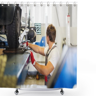 Personality  Young Serviceman Checking Wheel Alignment  In A Car Workshop  Shower Curtains