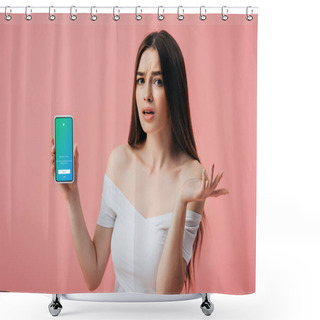Personality  KYIV, UKRAINE - JUNE 6, 2019: Beautiful Confused Girl Holding Smartphone With Twitter App And Showing Shrug Gesture Isolated On Pink Shower Curtains